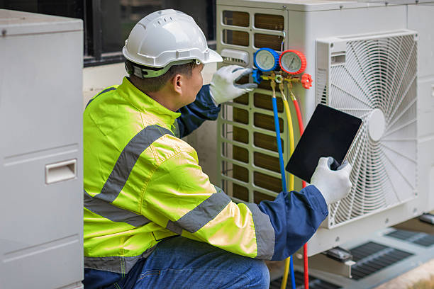 Professional Ac Installation technician working in Monroe City, IN